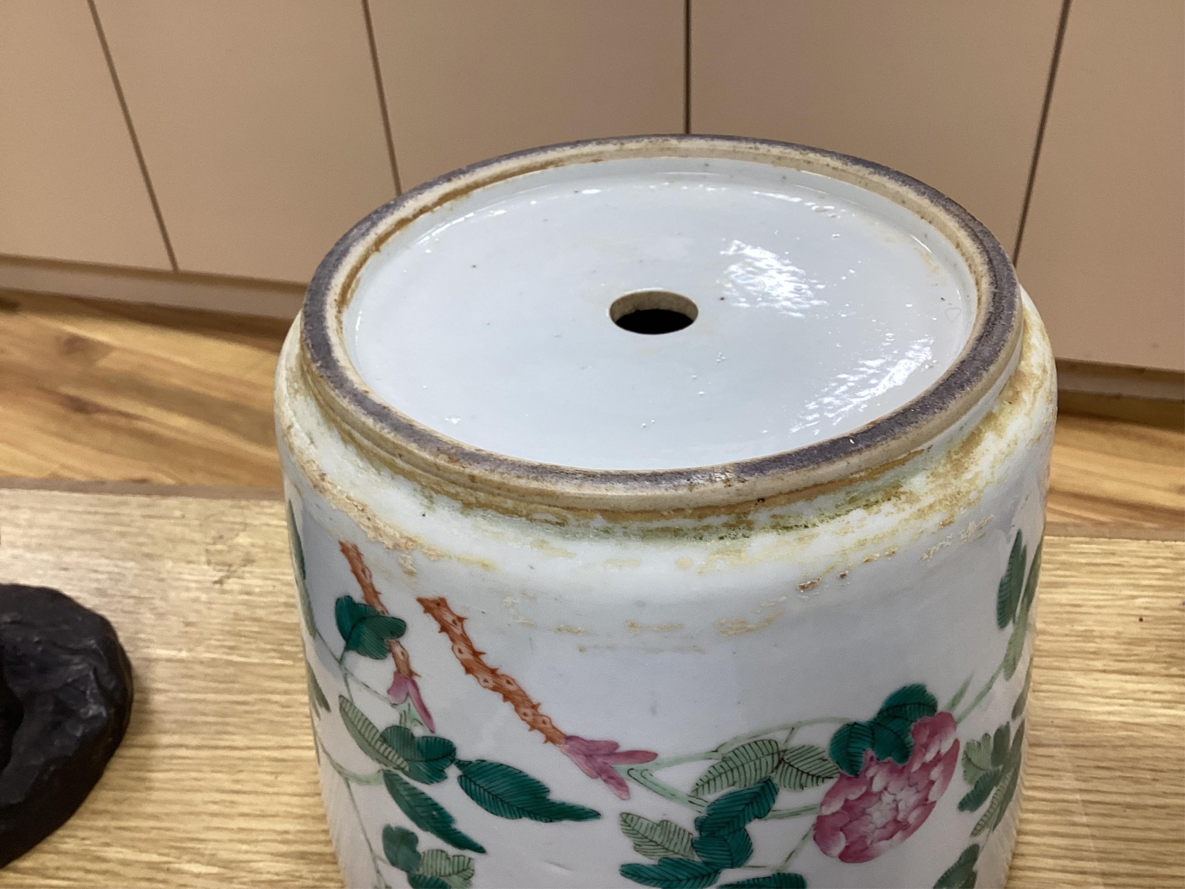 A 19th century Chinese famille rose flower pot, 19.5cm high. Condition - hole drilled to base.